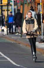 DIENA KRUGER Out Riding and E-scooter in New York 03/02/2022