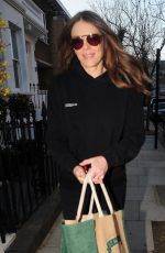ELIZABETH HURLEY Leaves Her Home in London 03/18/2022