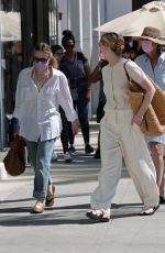 ELLE and DAKOTA FANNING Out Shopping on Rodeo Dr. in Beverly Hills 03/17/2022