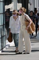 ELLE and DAKOTA FANNING Out Shopping on Rodeo Dr. in Beverly Hills 03/17/2022