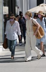 ELLE and DAKOTA FANNING Out Shopping on Rodeo Dr. in Beverly Hills 03/17/2022