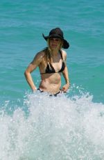 EUGENIE BOUCHARD in Bikini at a Beach in Miami 03/27/2022