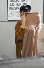 GIGI HADID and Her Daughter at JFK Airport in New York 03/06/2022