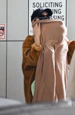 GIGI HADID and Her Daughter at JFK Airport in New York 03/06/2022