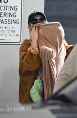 GIGI HADID and Her Daughter at JFK Airport in New York 03/06/2022