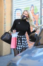 HOLLY MDISON at Crumbs & Whiskers Kitten & Cat Cafe Pet Store in West Hollywood 03/11/2022