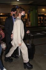 KATE BECKINSALE Arrives at LAX Airport in Los Angeles 03/13/2022