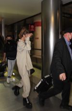 KATE BECKINSALE Arrives at LAX Airport in Los Angeles 03/13/2022