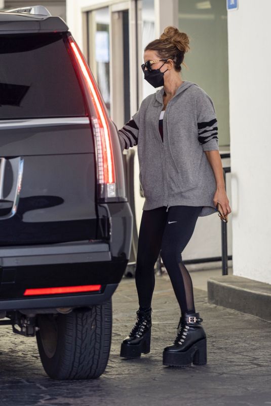 KATE BECKINSALE Leaves a Skin Care Clinic in Los Angeles 03/30/2022