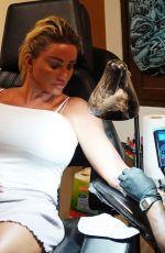 KATIE PRICE Getting Her Second Tattoo on Holiday in Thailand 03/14/2022