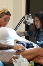 KATIE PRICE Getting Her Second Tattoo on Holiday in Thailand 03/14/2022