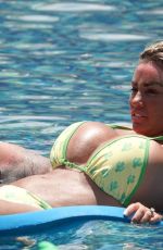 KATIE PRICE in Bikini at a Pool in Thailand 03/20/2022