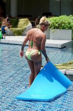 KATIE PRICE in Bikini at a Pool in Thailand 03/20/2022
