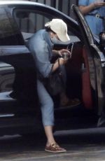 KATY PERRY in a Denim Jumpsuit Visits a Friend in Los Angeles 03/25/2022