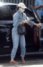 KATY PERRY in a Denim Jumpsuit Visits a Friend in Los Angeles 03/25/2022
