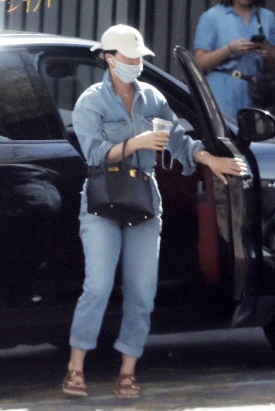 KATY PERRY in a Denim Jumpsuit Visits a Friend in Los Angeles 03/25/2022