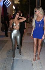 KIM and KHLOE KARDASHIAN Leaves SKIMS Pop-up Shop in Miami 03/19/2022