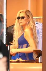 KIM and KHLOE KARDASHIAN Leaves SKIMS Pop-up Shop in Miami 03/19/2022