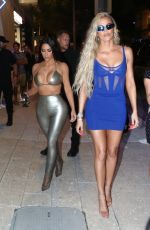 KIM and KHLOE KARDASHIAN Leaves SKIMS Pop-up Shop in Miami 03/19/2022