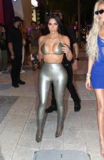 KIM and KHLOE KARDASHIAN Leaves SKIMS Pop-up Shop in Miami 03/19/2022
