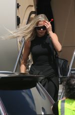 KIM and KHLOE KARDASHIAN Touch Down at Van Nuys Airport 03/20/2022