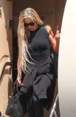 KIM and KHLOE KARDASHIAN Touch Down at Van Nuys Airport 03/20/2022
