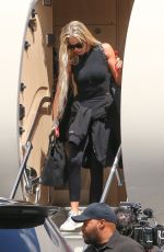KIM and KHLOE KARDASHIAN Touch Down at Van Nuys Airport 03/20/2022