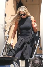 KIM and KHLOE KARDASHIAN Touch Down at Van Nuys Airport 03/20/2022