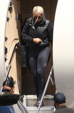 KIM and KHLOE KARDASHIAN Touch Down at Van Nuys Airport 03/20/2022