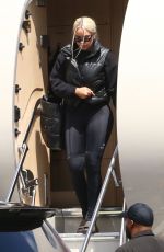 KIM and KHLOE KARDASHIAN Touch Down at Van Nuys Airport 03/20/2022