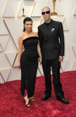 KOURTNEY KARDASHIAN and Travis Barker Arrives at 94th Annual Academy Awards at Dolby Theatre in Los Angeles 03/27/2022