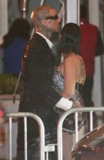 KOURTNEY KARDASHIAN and Travis Barker Leaves Vanity Fair Oscar Party in Beverly Hills 03/27/2022