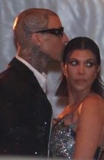 KOURTNEY KARDASHIAN and Travis Barker Leaves Vanity Fair Oscar Party in Beverly Hills 03/27/2022