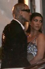 KOURTNEY KARDASHIAN and Travis Barker Leaves Vanity Fair Oscar Party in Beverly Hills 03/27/2022