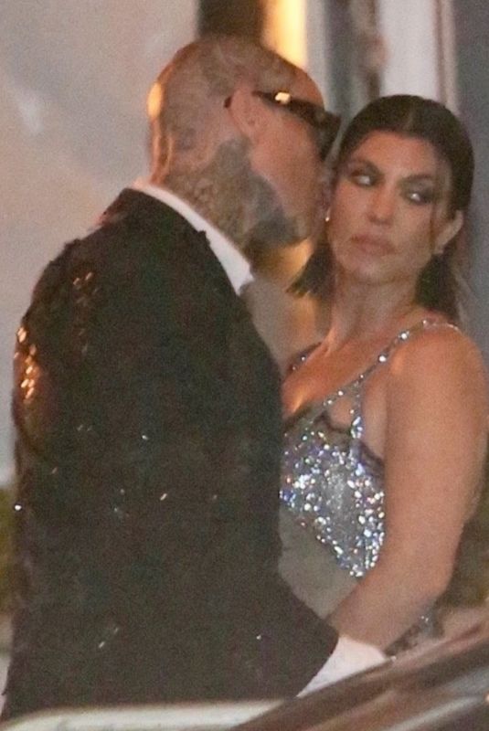 KOURTNEY KARDASHIAN and Travis Barker Leaves Vanity Fair Oscar Party in Beverly Hills 03/27/2022
