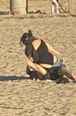 KOURTNEY KARDASHIAN and Travis Barker on the Beach in Laguna Beach 03/10/2022