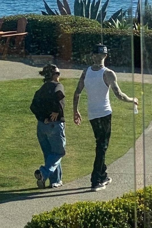 KOURTNEY KARDASHIAN and Travis Barker on the Beach in Laguna Beach 03/10/2022