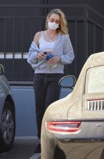KRISTEN STEWART Leaves a Hair Salon in Beverly Hills 03/22/2022