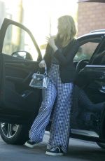 LAURA DERN Out with a Friend at a Restaurant in Brentwood 03/29/2022