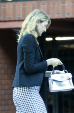 LAURA DERN Out with a Friend at a Restaurant in Brentwood 03/29/2022