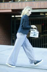 LAURA DERN Out with a Friend at a Restaurant in Brentwood 03/29/2022