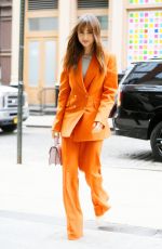 LILY COLLINS Arrives at the rosby Hotel in New York 03/23/2022