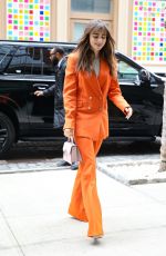 LILY COLLINS Arrives at the rosby Hotel in New York 03/23/2022