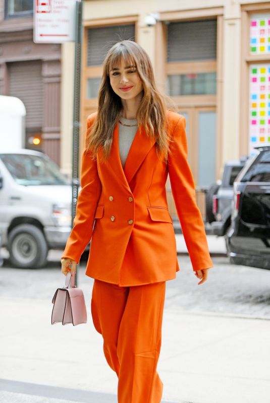 LILY COLLINS Arrives at the rosby Hotel in New York 03/23/2022