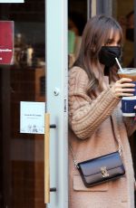 LILY COLLINS at a Coffee Shop in New York 03/22/2022