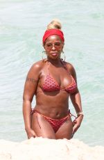 MARY J. BLIGE in Bikini at a Beach in Miami 03/12/2022