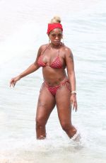 MARY J. BLIGE in Bikini at a Beach in Miami 03/12/2022