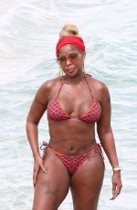 MARY J. BLIGE in Bikini at a Beach in Miami 03/12/2022