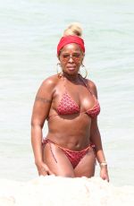 MARY J. BLIGE in Bikini at a Beach in Miami 03/12/2022