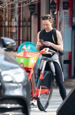 MELANIE CHISHOLM Out for a Bike Ride in London 03/23/2022